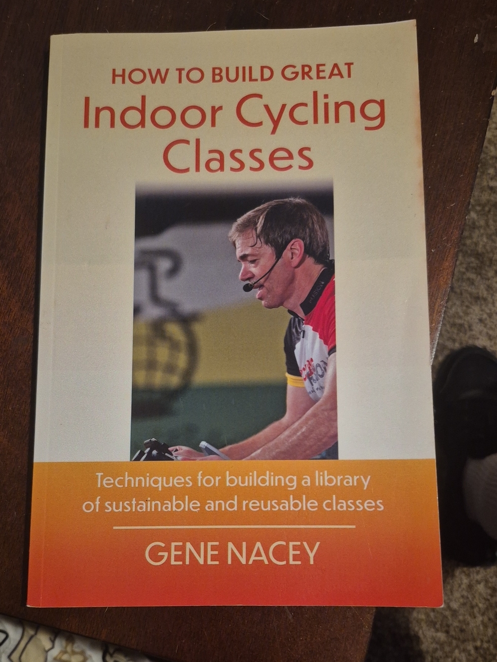 Spin Instructor /Indoor Cycling Classes by Gene Nacey - Orange Cover